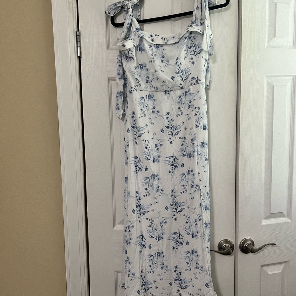 Brand new and never worn. Doesn’t not fit. Beautiful dress.